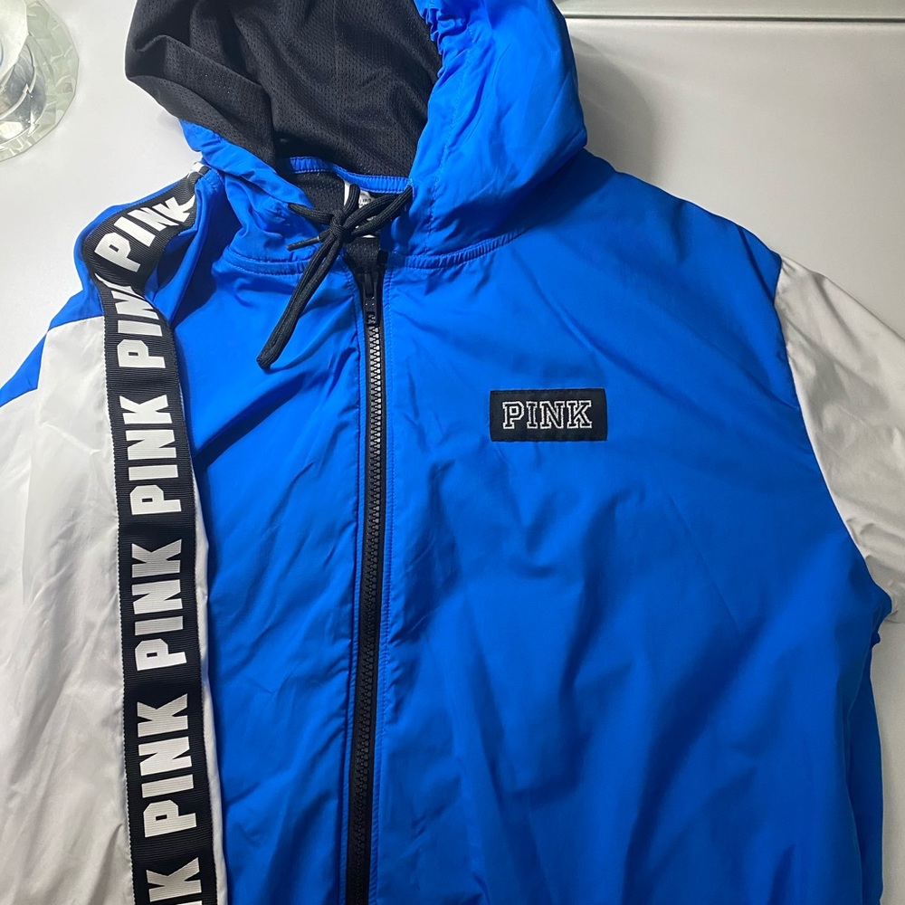 pink clothing wind breaker